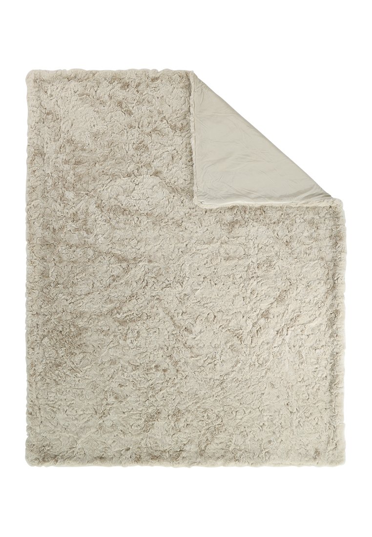 Zachte, getextureerde deken in lichtbeige met een gladde onderkant, voorzien van een pluizige,{