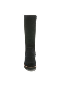 Tall black suede boot with a smooth surface, rounded toe, and side zipper. Features a low, ridged rubber sole for traction.