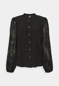Black blouse featuring a buttoned front, rounded collar, and sheer embroidered puff sleeves. Texture varies between solid and lace.