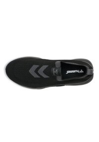 Black slip-on shoes featuring a breathable mesh upper, prominent gray chevron patterns, and a textured rubber sole.