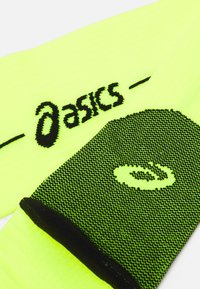 ASICS PERFORMANCE RUN COMPRESSION UNISEX - Chaussettes de sport - safety yellow
