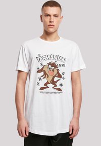 White cotton t-shirt featuring a graphic of the Tasmanian Devil character, with black text and playful symbols. Standard fit, short sleeves.