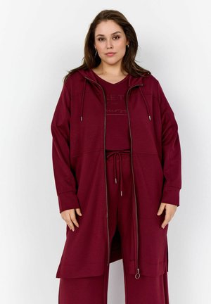 Bordeaux zip-up hoodie met trekkoorden, lange mouwen en zijsplitten, gecombineerd met een bijpassend topje. Glad textuur en een ontspannen pasvorm.