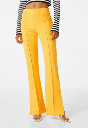 FLARE - Pantaloni - mustard yellow