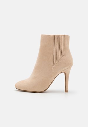 Bottines à talons hauts - beige