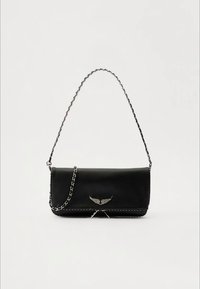 Black leather handbag with a chain strap, featuring a winged emblem and white stitching. Compact rectangular shape with a smooth texture.