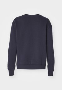 Felpa blu navy con collo a giro, polsini e orlo a costine. Tessuto morbido con una finitura texturizzata, progettata per un fit rilassato.