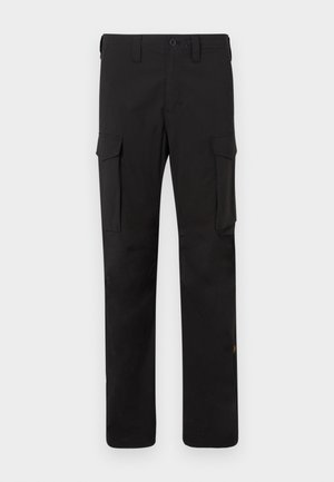 Pantalones cargo negros fabricados con un tejido duradero, que cuentan con bolsillos laterales, un corte recto y un detalle con cremallera cerca del dobladillo.