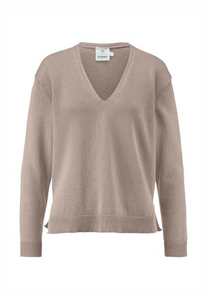 V-neck sweater in soft beige knit. Features ribbed cuffs, hem, and side slits. Tag visible at neckline. Simple, relaxed fit design.