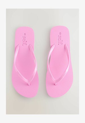 Rózsaszín gumi strandpapucs texturált talprésszel és vékony, sima pántokkal. A "self." márkanevének beütése a talpban.