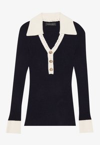 Navy ribbed knit sweater with a white collar, V-neck, four gold-button placket, and white accents at the cuffs.