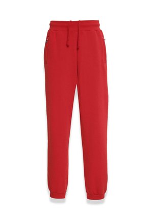 Rote Sweatpants aus weichem Material mit einem elastischen Bund und Zugband, seitlichen Taschen und schmalen Bündchen an den Knöcheln.