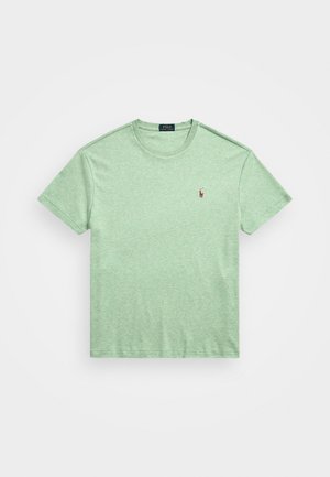 Zaļš kokvilnas T-krekls ar apaļu izgriezumu, īsām piedurknēm un mazu izsistu logotipu kreisajā krūtī. Strukturēts, heather audums.