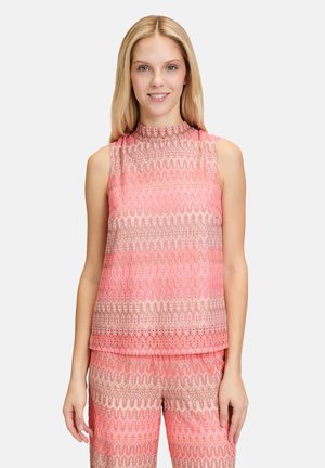 Ärmelloses Oberteil in Pink und Beige, mit geripptem Stoff und hohem Kragen. Verfügt über ein Wellenmuster und einen lockeren Schnitt für zusätzlichen Komfort.