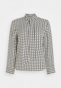 Blusa a maniche lunghe bianca con motivo a quadri neri, dotata di un colletto alto e un dettaglio a cravatta sul collo, realizzata in tessuto morbido.