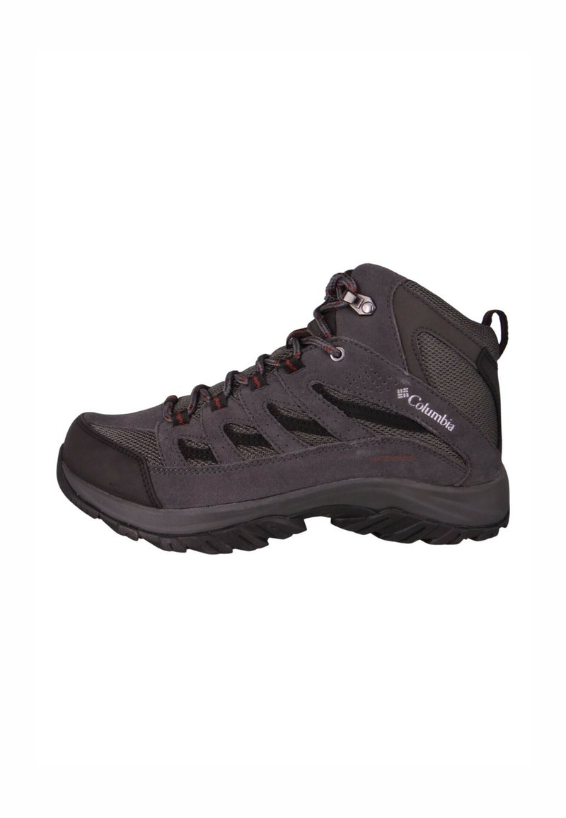 Halflange wandelschoen in donkergrijs met mesh- en suède materialen. Voorzien van rode accenten en een gestructureerde, robuuste rubberen zool voor grip.