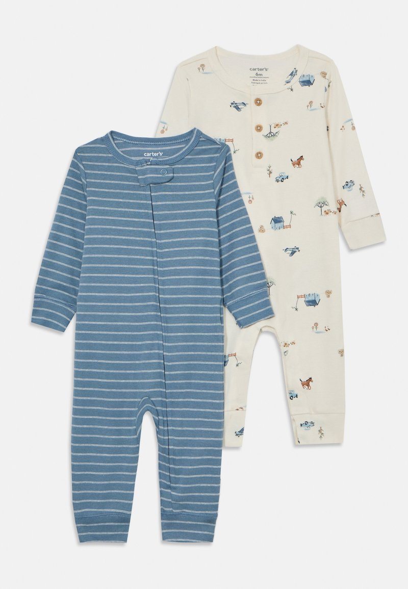 To barne romper: en i blått med hvite striper, den andre i krem med fargerike dyremotiver og detaljer i treknapper.