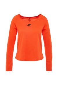 Langærmet, orange Nike Air skjorte i tekstureret stof med en bred udskæring og et lille, sort logo på brystet.