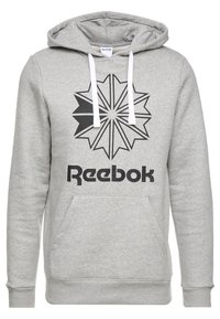 Šedá mikina s kapucí vyrobená z měkké tkaniny, s velkým černým hvězdným logem a nápisem "Reebok" v tučném černém písmu. Obsahuje přední kapsu a stahovací kapucu.