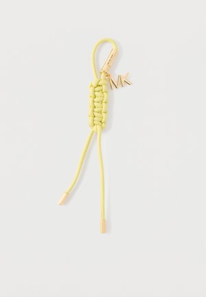 Yellow braided leather keychain with gold-tone hardware and "MK" charm on a white background.