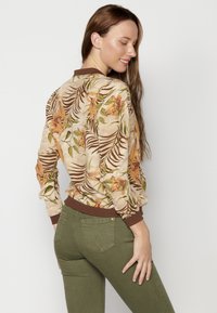 Koroshi Felpa con zip - beige