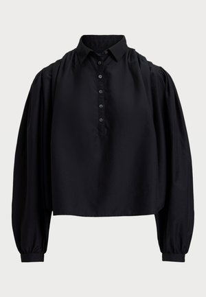 Schwarzes, kurzes Shirt aus weichem Stoff, mit einer geknöpften Leiste, hohem Kragen und puffierten langen Ärmeln mit enganliegenden Bündchen.
