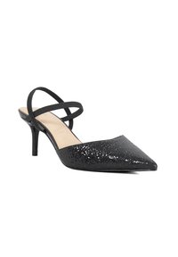 Black slingback heels feature a pointed toe, shiny textured upper, and thin crisscross straps. The heel height is moderate.