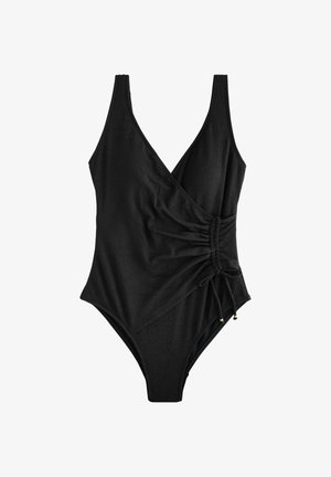Bañador negro de una pieza con escote en V, tejido texturizado, detalle fruncido lateral y cordón ajustable en la cintura derecha.