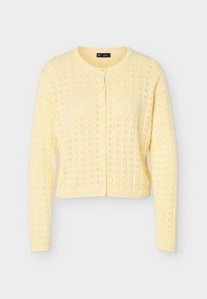 Ανοιχτό κίτρινο πλεκτό ζακέτα με μακριά μανίκια, στρογγυλή λαιμόκοψη, κλείσιμο με κουμπιά και λουλουδένιο ανάγλυφο σχέδιο παντού.