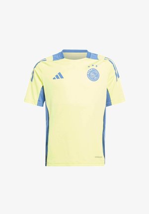Camiseta de fútbol corta de manga amarilla clara con detalles azules, que presenta el logo del Ajax y tres estrellas. Fabricada con tejido transpirable, Aeroready.