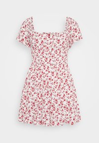 Blommig klänning med en vit bakgrund och röda blommor, korta puffärmar, fyrkantig halsringning och en utsvängd kjol.