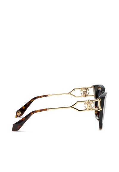 Lunettes de soleil avec monture avant noire, branches en métal doré présentant des logos décoratifs dorés, et temples à motif écaille.
