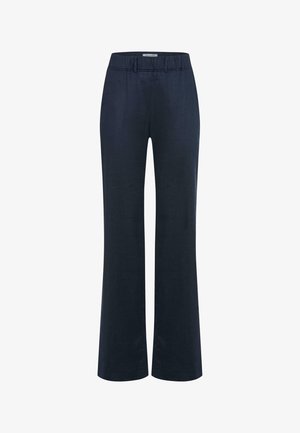 Marineblå bukser med lige ben, elastisk talje og uden synlige lommer, vist mod en hvid baggrund.