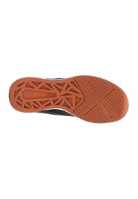 Suola nera di scarpa da ginnastica con una suola in gomma arancione testurizzata, dotata di un motivo a trama geometrica per trazione e stabilità.