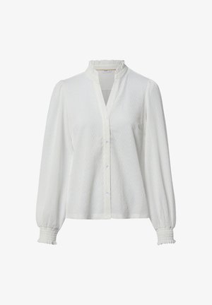 White long-sleeve blouse with subtle textured wave pattern, ruffled high collar, button-down front, and smocked cuffs.