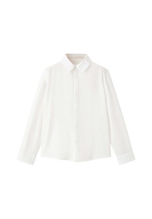 Chemise blanche à manches longues avec boutons, col pointu et poignets boutonnés, posée à plat sur fond blanc.