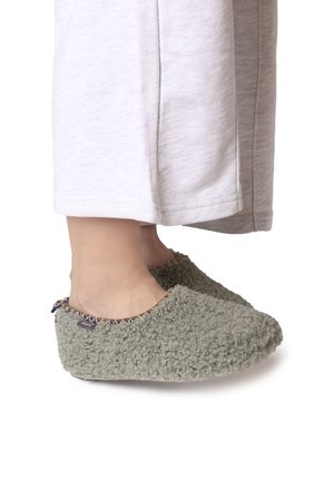Green, fluffy slippers with a soft texture, featuring a wide opening, a blue and orange patterned trim, and a rounded shape.