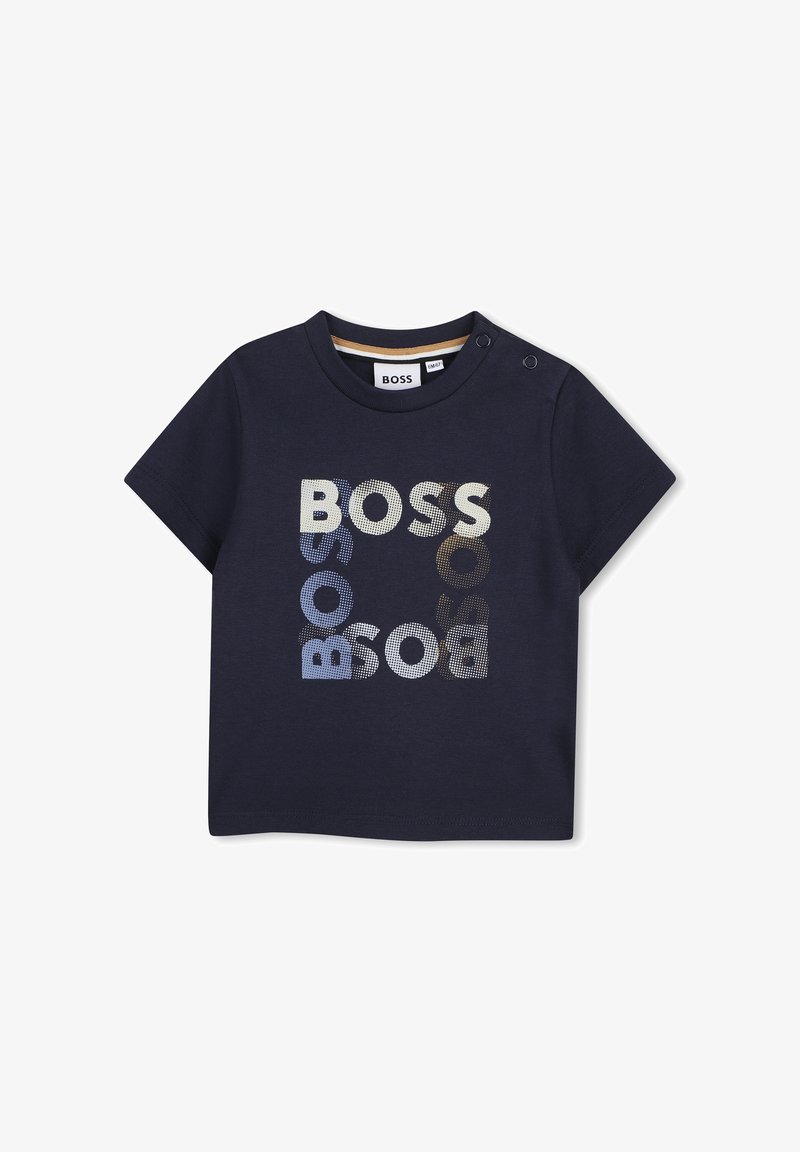 Chemise pour tout-petit à manches courtes bleu marine avec "BOSS" imprimé quatre fois en carré, motif de points multicolores, et boutons-pression à l'épaule.