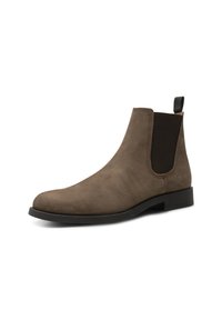Brown suede Chelsea boot with elastic side panels, pointed toe, and a black rubber sole. Features a pull tab for easy wear.