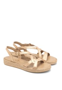 Beisid strappy sandaalid, millel on tekstuuriga espadrille tald. Omab ristuvaid rihmasid ja pandla kinnitust. Pehme nahk materjal.