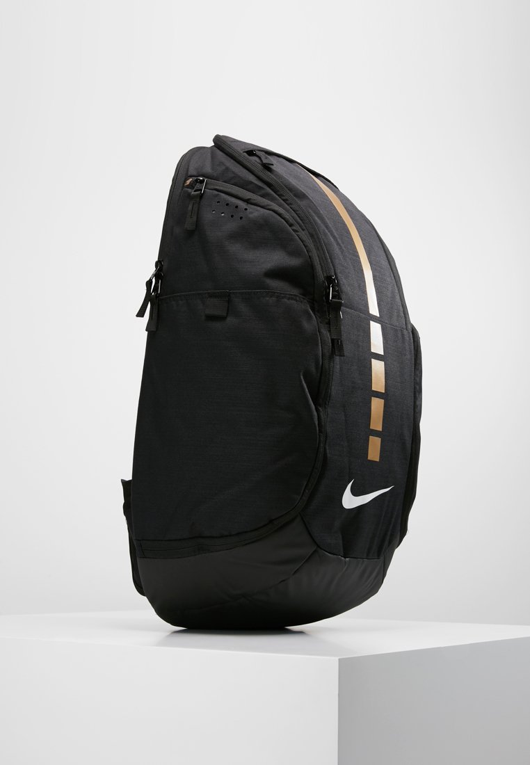 black and gold nike backpack