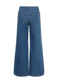 Wide-leg blue denim jeans with a high waist, featuring two back pockets and a textured fabric. The hem is slightly frayed.