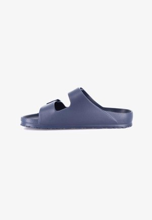Sandalo slide in gomma blu navy con punta aperta, due cinturini regolabili e suola testurizzata, mostrato di lato su sfondo bianco.