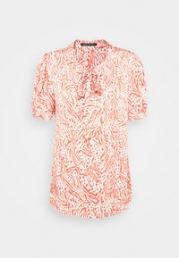 Krátký rukáv blůza z světlého růžového materiálu s abstraktními červenými vzory a detailem na zavazování u výstřihu. Uvolněný střih s jemnou strukturou.