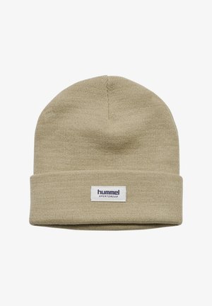 Knit beige beanie with a folded cuff and a white label featuring the brand name "hummel" in navy. Soft texture, simple design.