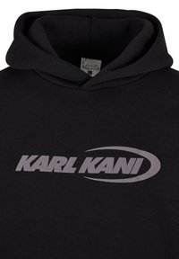 Black hoodie made of soft fabric featuring a grey "KARL KANI" logo with an oval accent. Includes a drawstring hood and ribbed cuffs.
