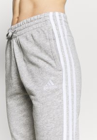 adidas Performance Treniņtērpa apakšdaļas - medium grey heather/white