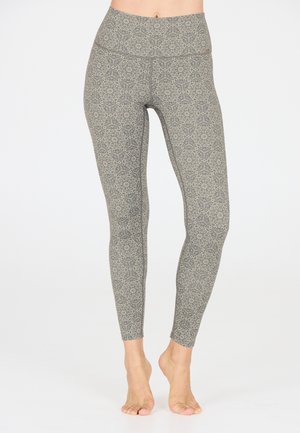 Grijze patroonleggings met een hoge tailleband, voorzien van bloemenmotieven en een gladde textuur, ontworpen voor comfort en flexibiliteit.