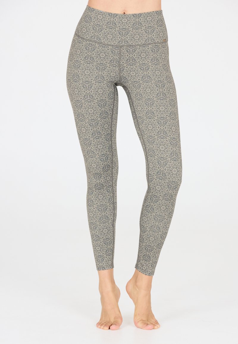 Grijze patroonleggings met een hoge tailleband, voorzien van bloemenmotieven en een gladde textuur, ontworpen voor comfort en flexibiliteit.