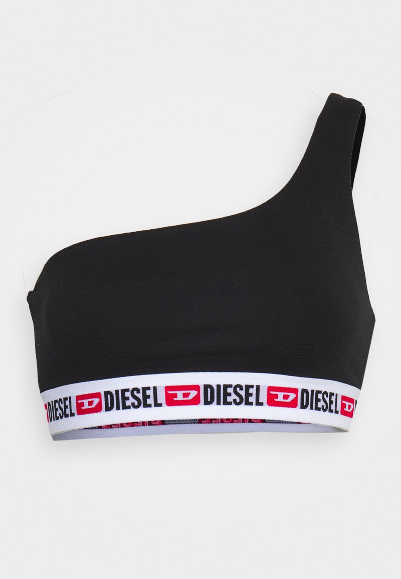Soutien-gorge noir à une épaule avec une large bande élastique arborant un logo "DIESEL" rouge et blanc, et une texture douce et lisse.